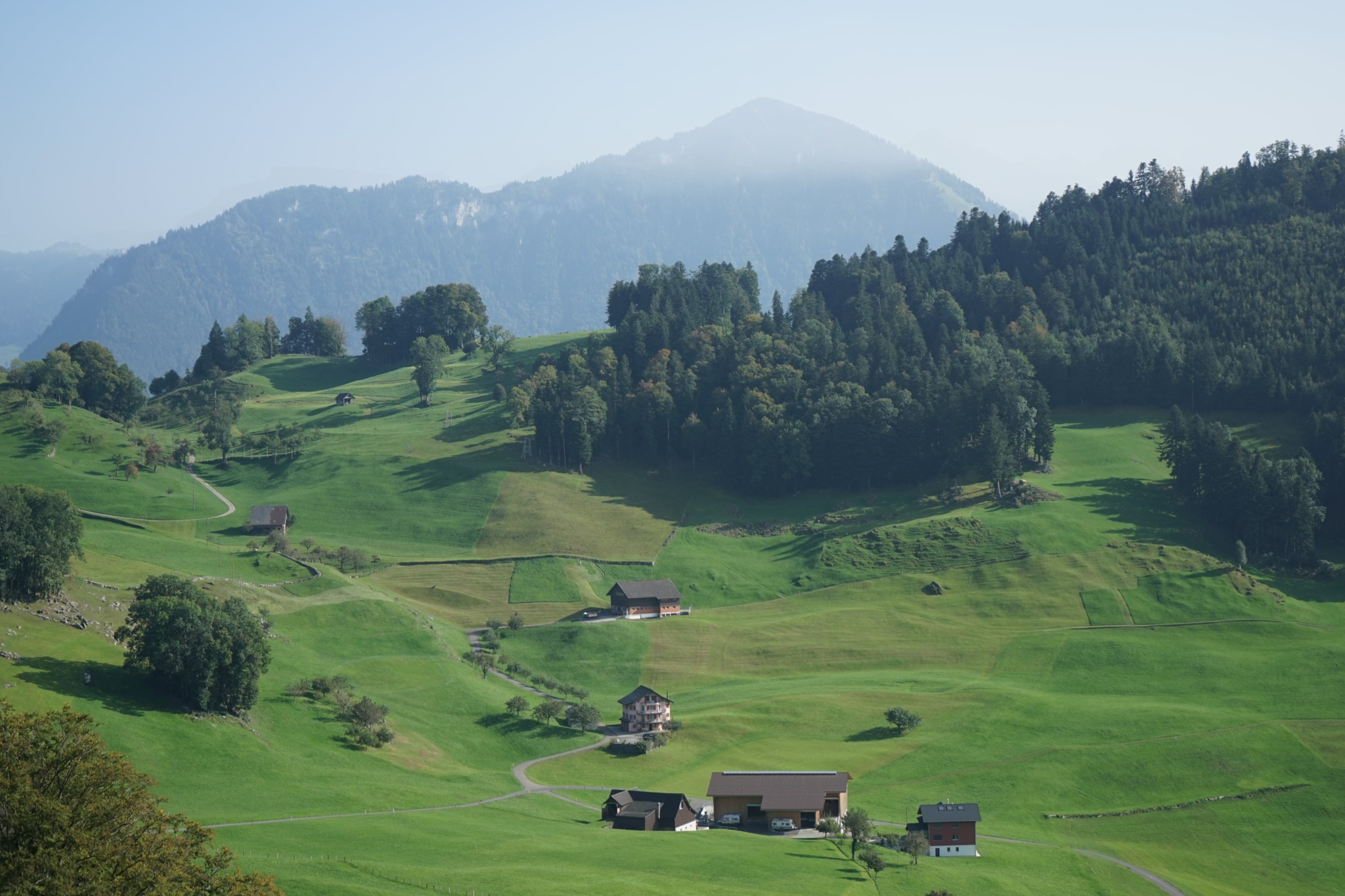 rolling hills and mountains in summer in switzerland